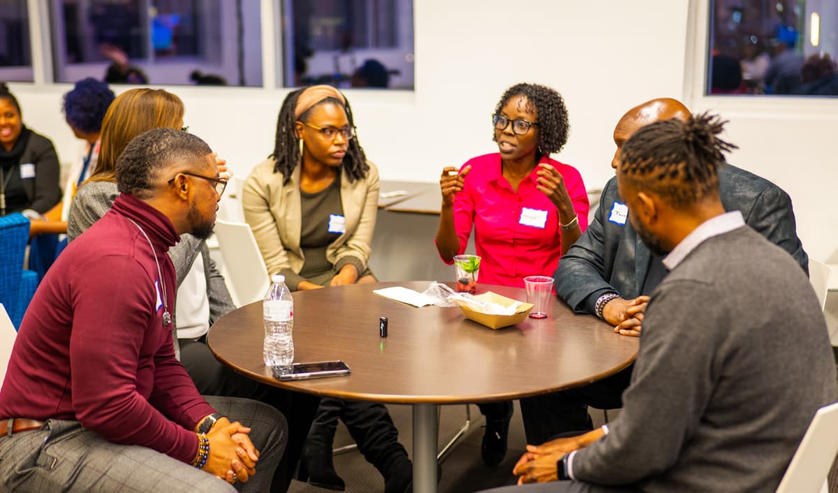 Black community innovators collaborating on solutions